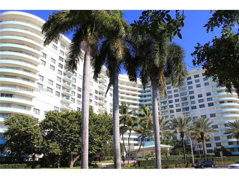 5161 Collins Avenue, Unit 806 Miami Beach, FL 33140 - Photo 37 of 52 a view of a yard with a tree