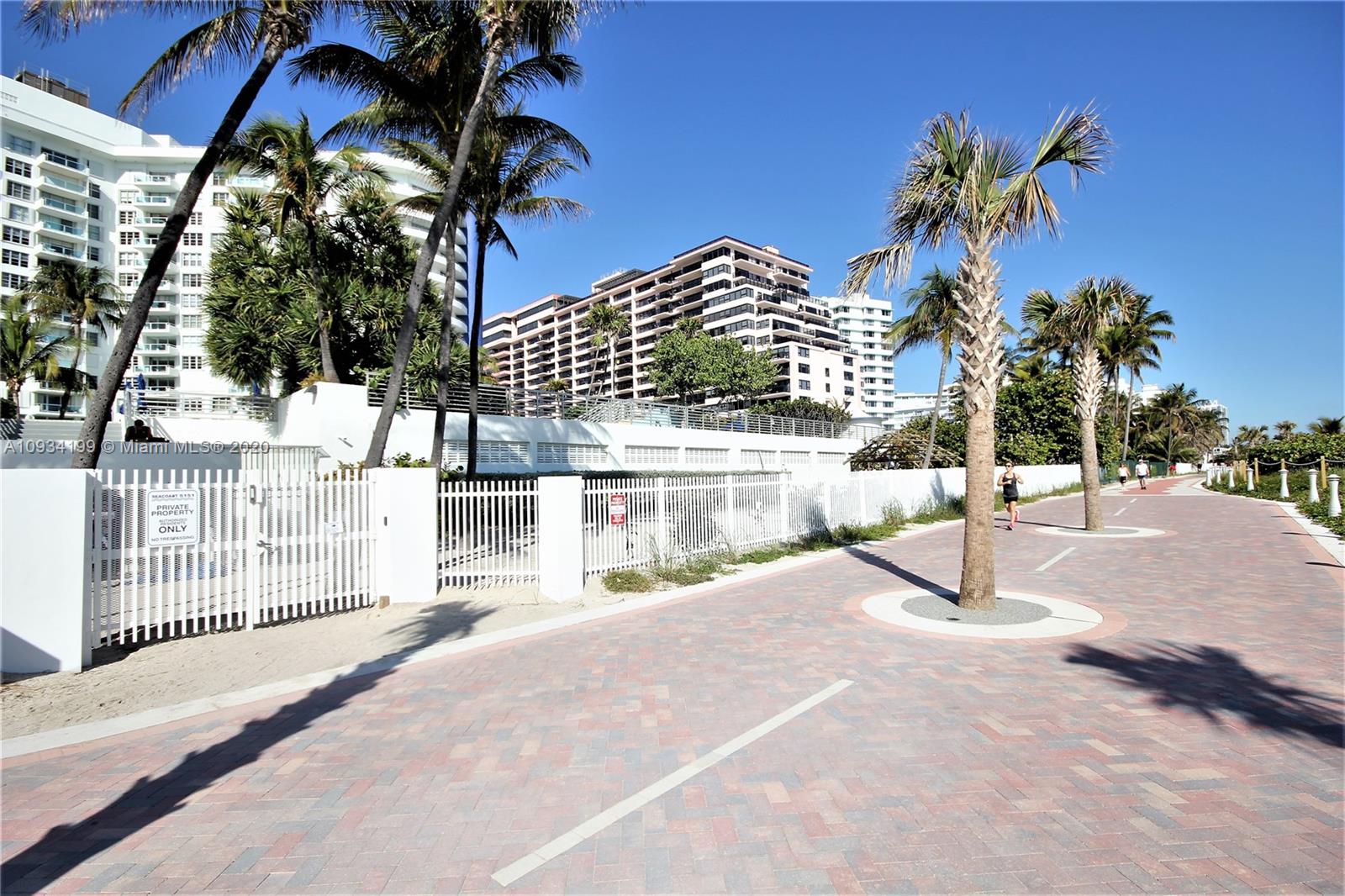 5161 Collins Avenue, Unit 806 Miami Beach, FL 33140 - Photo 39 of 52 a house with palm tree in front of it