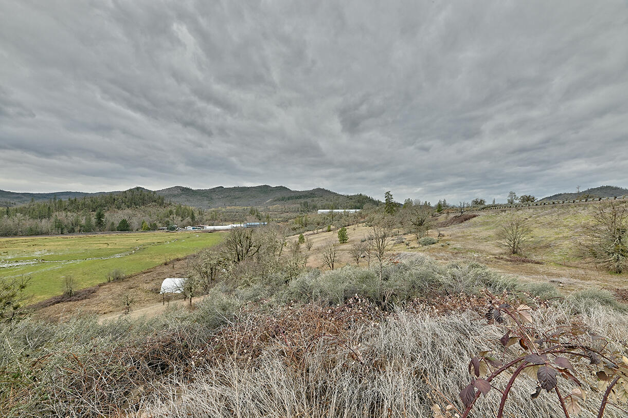 13546 Highway 140 Eagle Point, OR 97524 - Photo 18 of 24 a view of lake with mountain