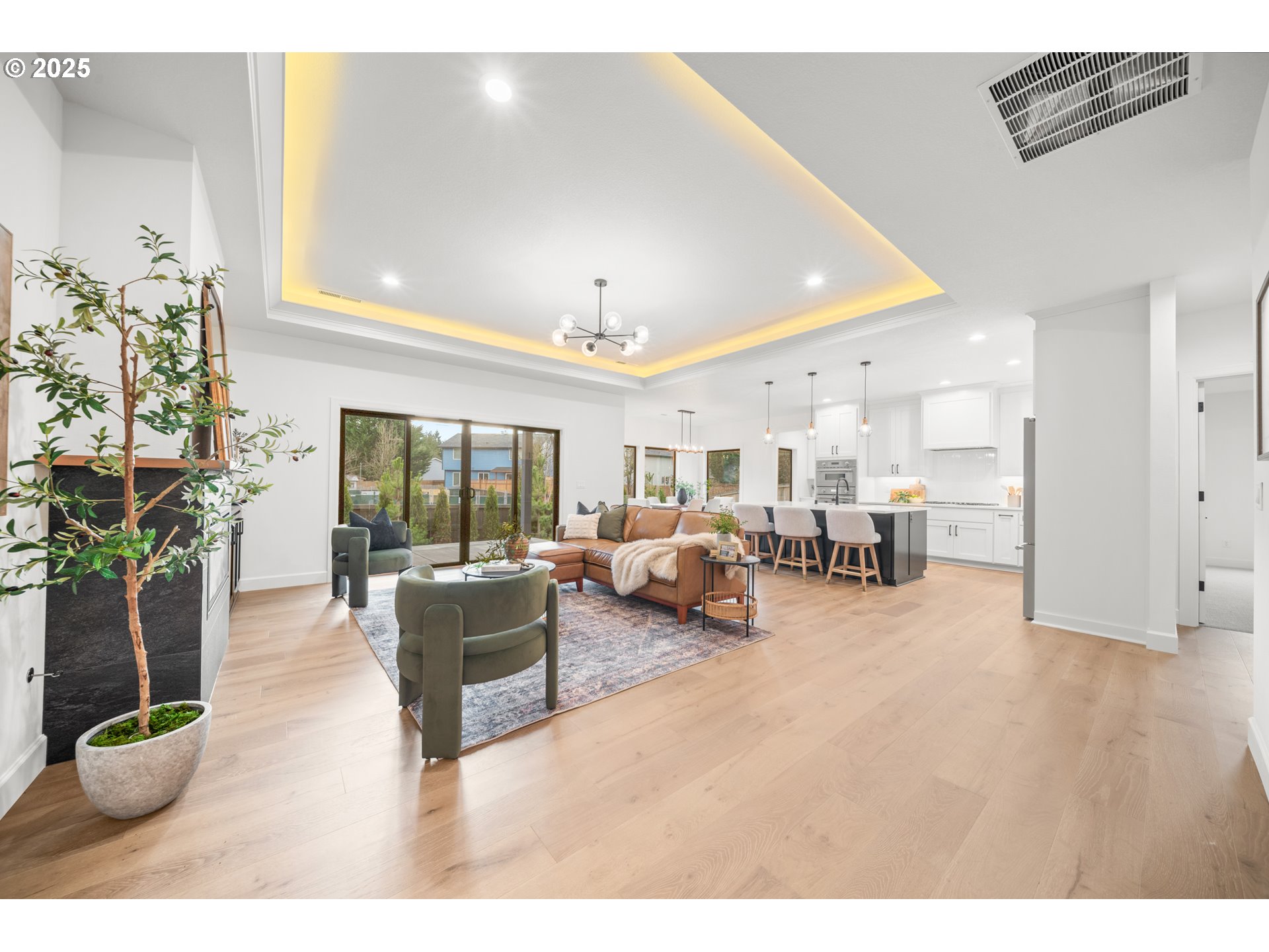 1211 Northwest 150th Street Vancouver, WA 98685 - Photo 4 of 23 a living room with furniture a couch and a potted plant