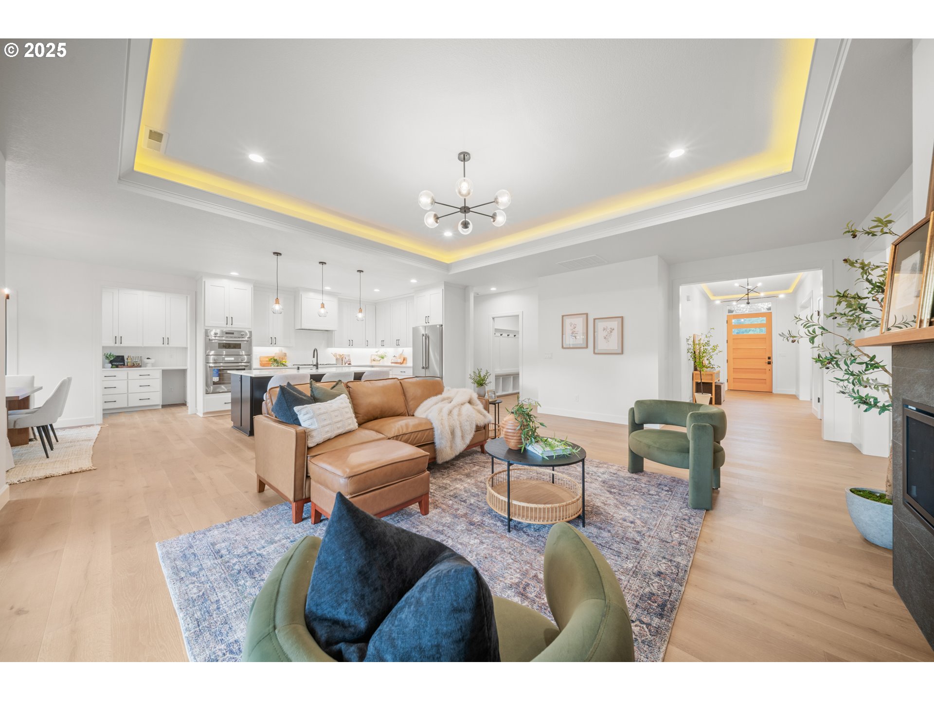 1211 Northwest 150th Street Vancouver, WA 98685 - Photo 5 of 23 a living room with furniture and a chandelier