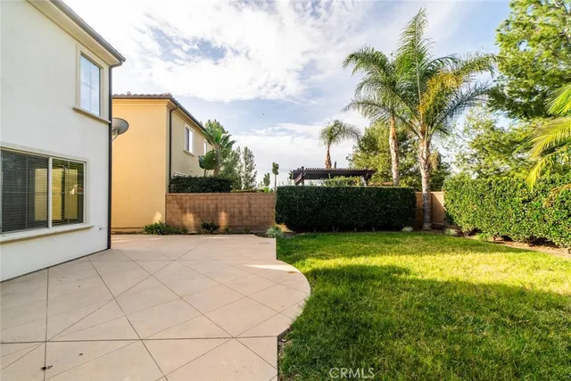 a view of a back yard of the house