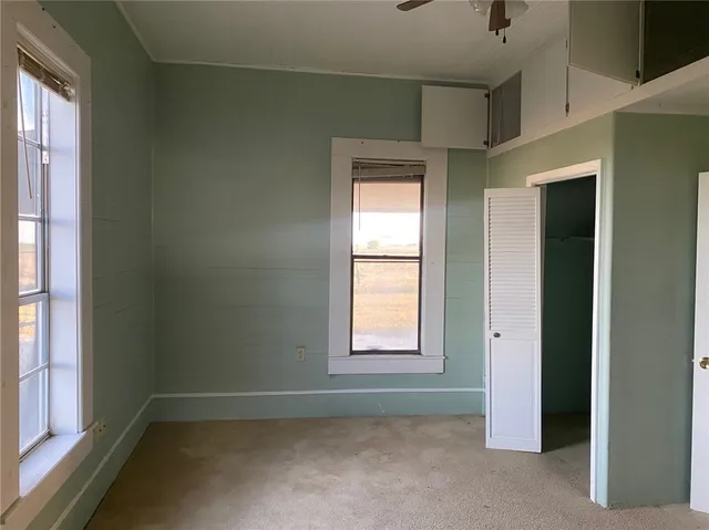 an empty room with windows