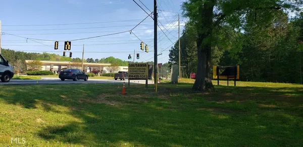 a view of a house with a big yard