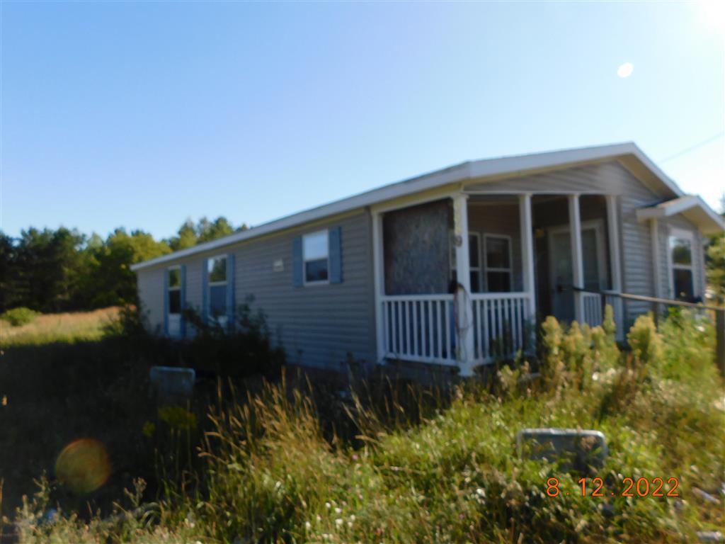 8889 Shippy Road Southwest Fife Lake, MI 49633 - Photo 2 of 10 front best