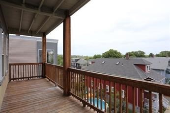 41 St Edward Road, Unit 3 Boston, MA 02128 - Photo 11 of 12 a view of balcony with furniture