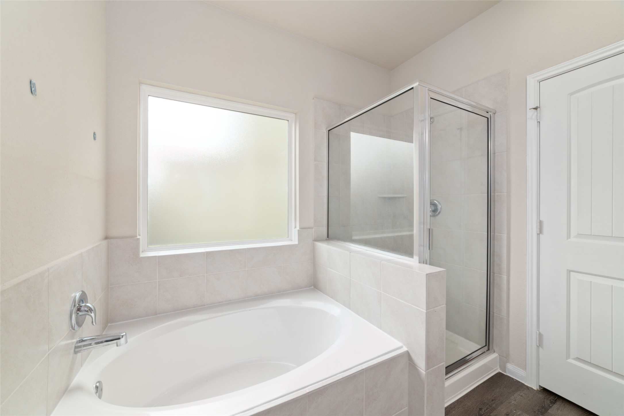2209 Raider Drive Conroe, TX 77301 - Photo 17 of 27 a white bath tub sitting in a bathroom