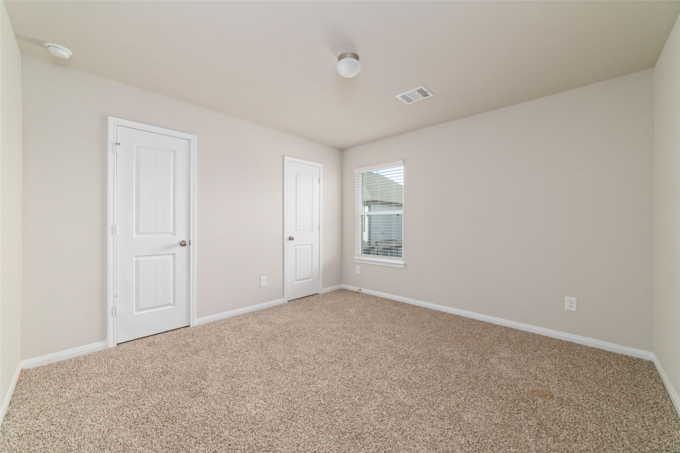 2209 Raider Drive Conroe, TX 77301 - Photo 25 of 27 a view of an empty room with a window