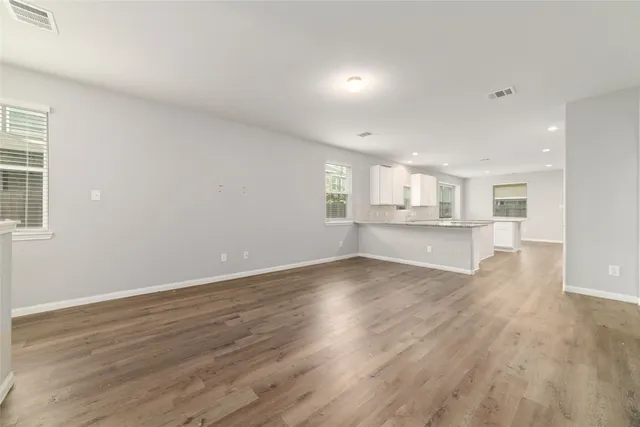 a view of kitchen with wooden floor