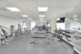 2016 Main Street, Unit 1116 Houston, TX 77002 - Photo 20 of 23 a view of a room with gym equipment