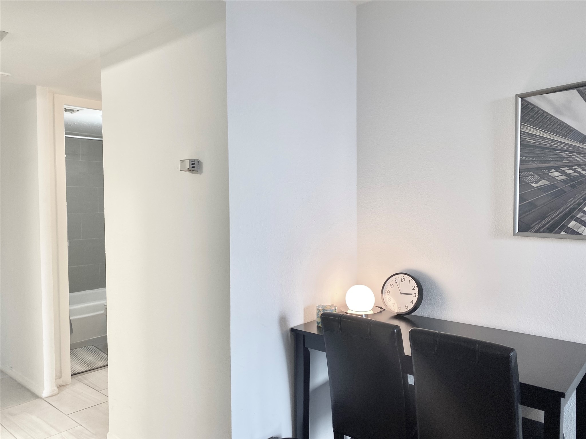 2016 Main Street, Unit 1116 Houston, TX 77002 - Photo 4 of 23 a view of a hallway with closet