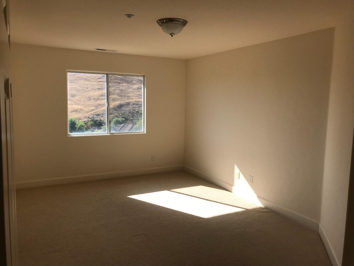 27860 Crowne Point Drive Salinas, CA 93908 - Photo 23 of 50 a view of an empty room with a window
