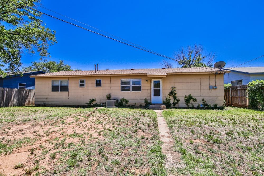 4418 33rd Street Lubbock, TX 79410 - Photo 21 of 21 a view of a house with a yard