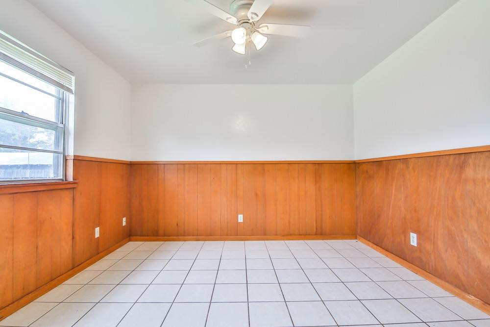 4418 33rd Street Lubbock, TX 79410 - Photo 8 of 21 a view of an empty room and window