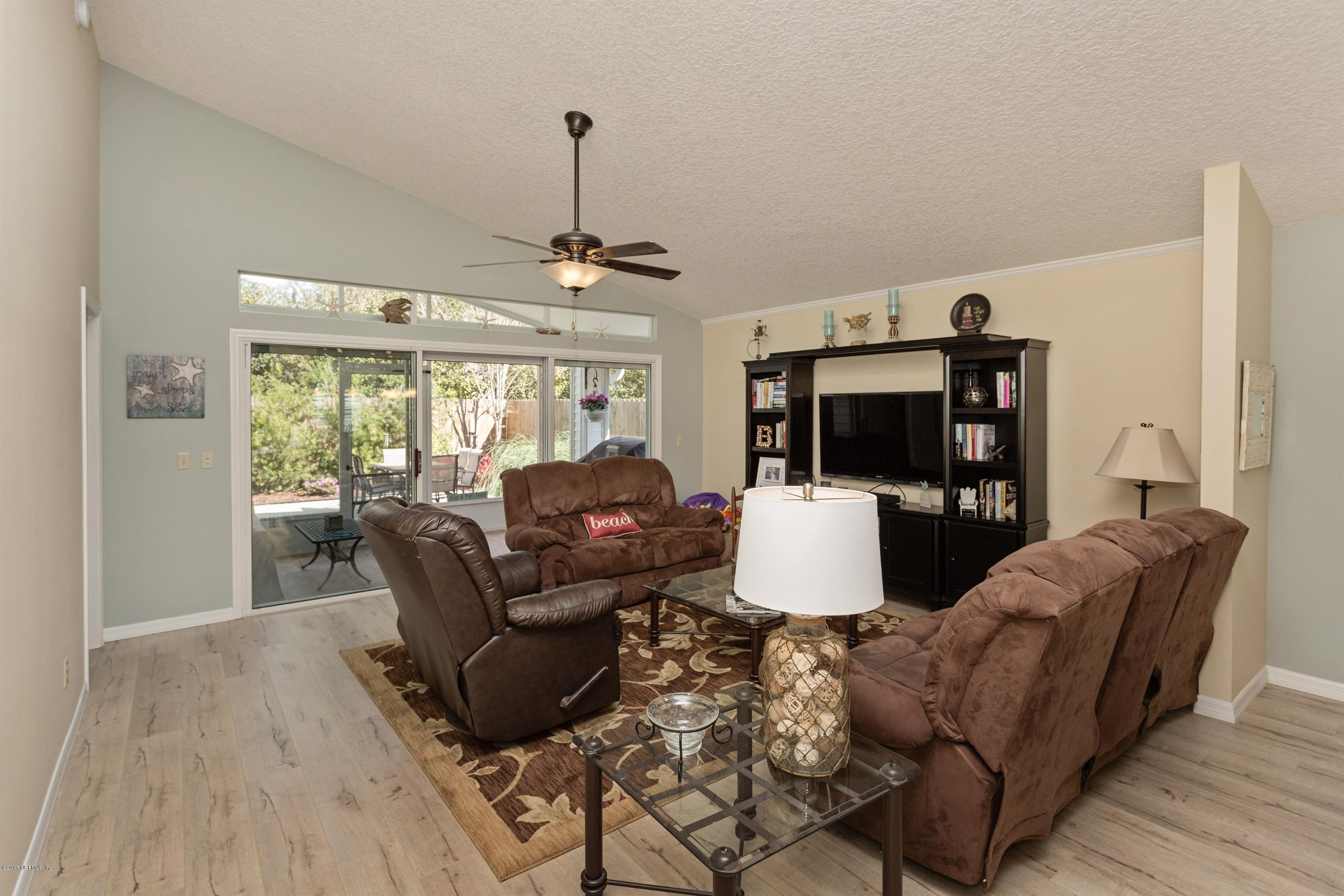 160 Patrick Mill Circle Ponte Vedra Beach, FL 32082 - Photo 7 of 23 a living room with furniture and a chandelier