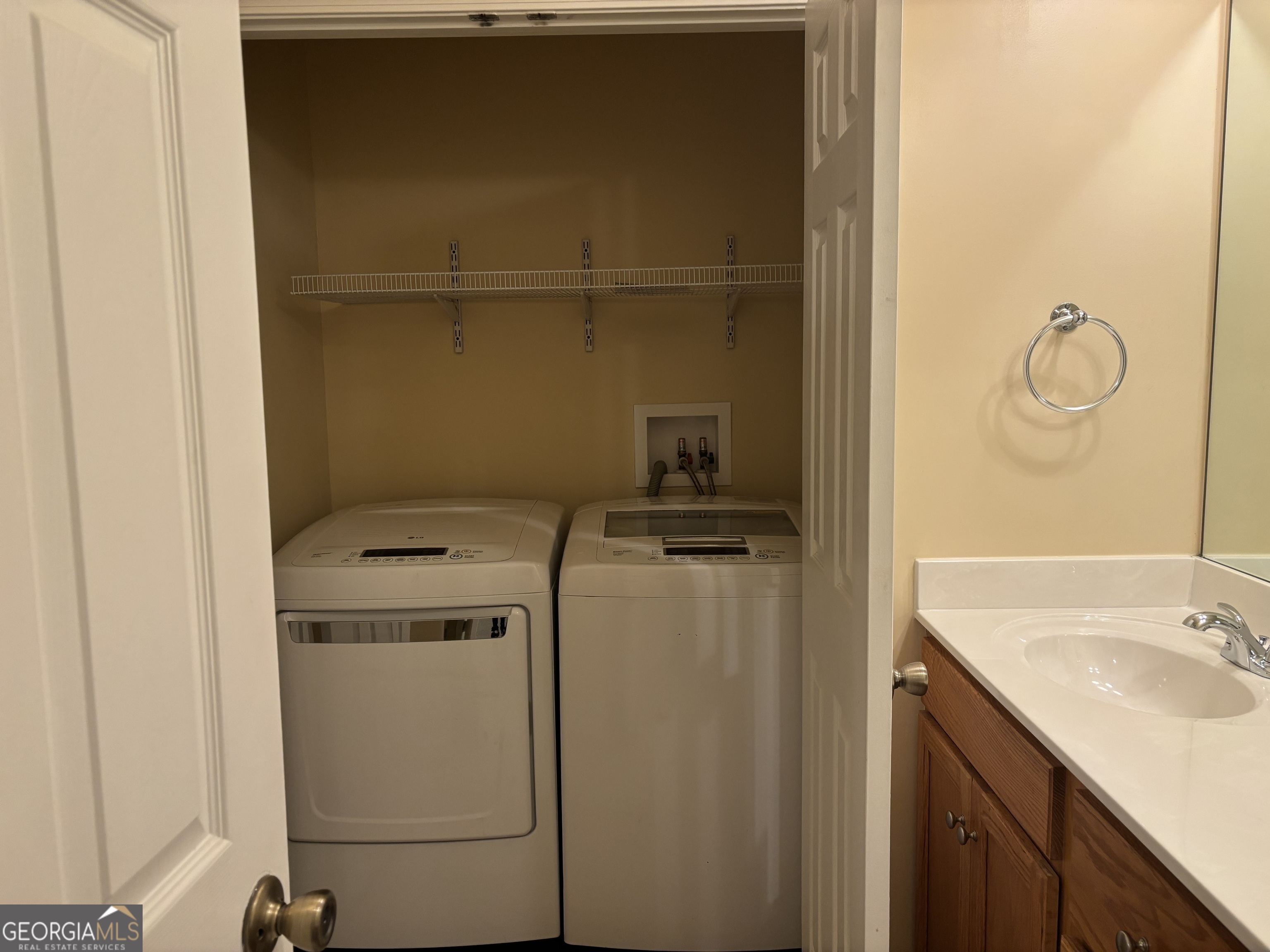 63 Highlander Trail Southwest Rome, GA 30165 - Photo 19 of 49 a utility room with dryer and washer