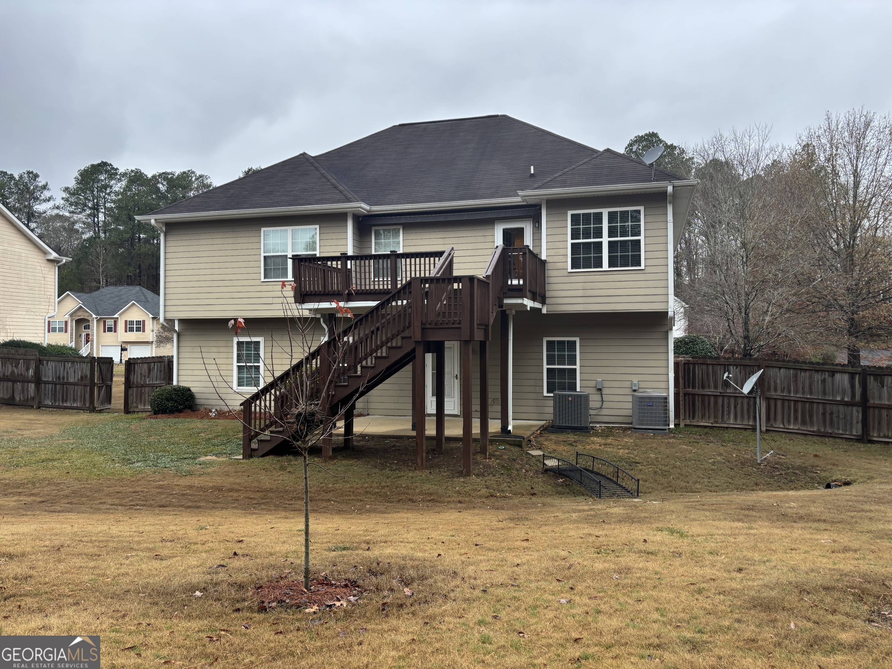 63 Highlander Trail Southwest Rome, GA 30165 - Photo 2 of 49 a front view of a house with a yard
