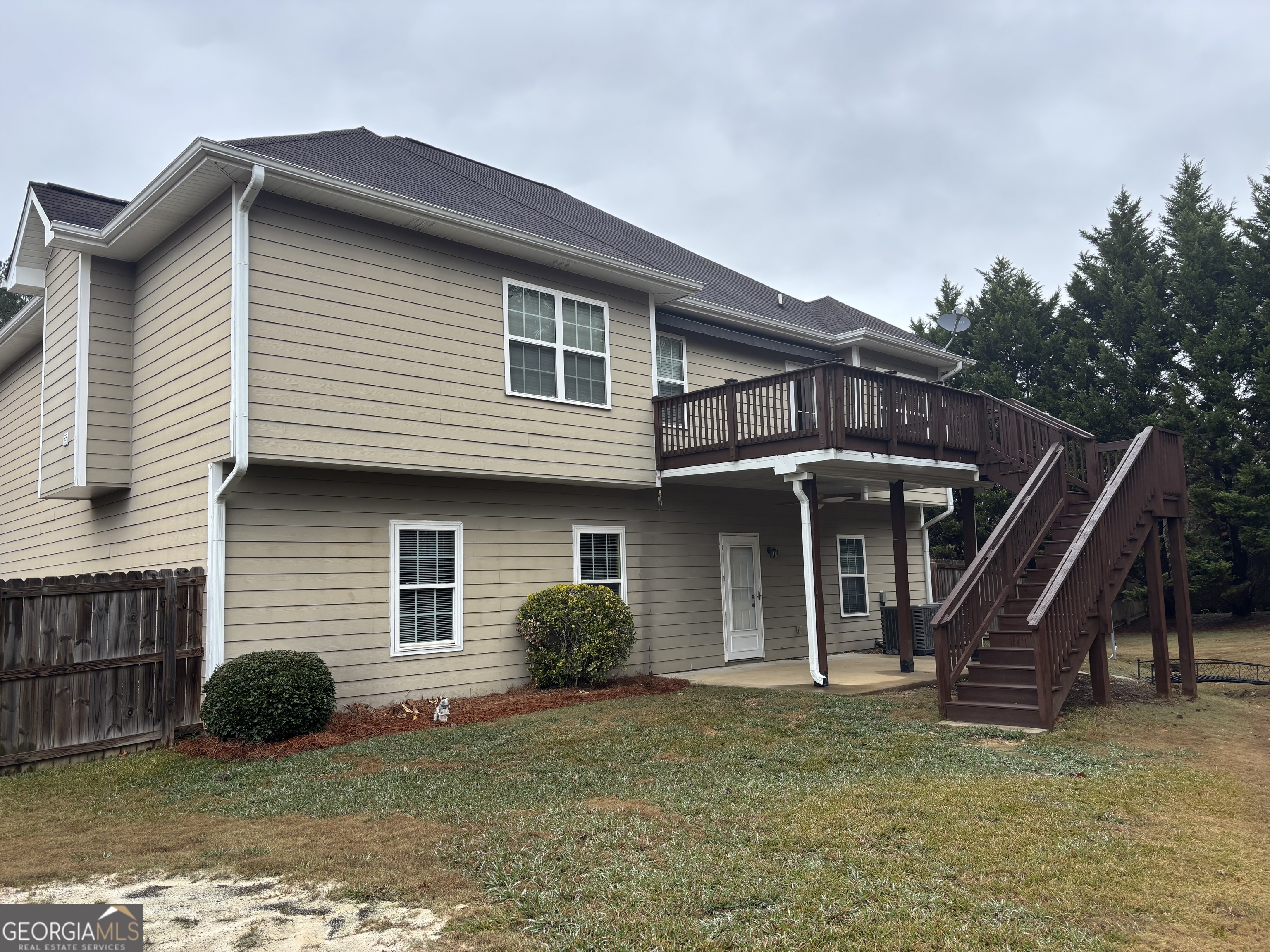 63 Highlander Trail Southwest Rome, GA 30165 - Photo 31 of 49 a front view of a house with a yard