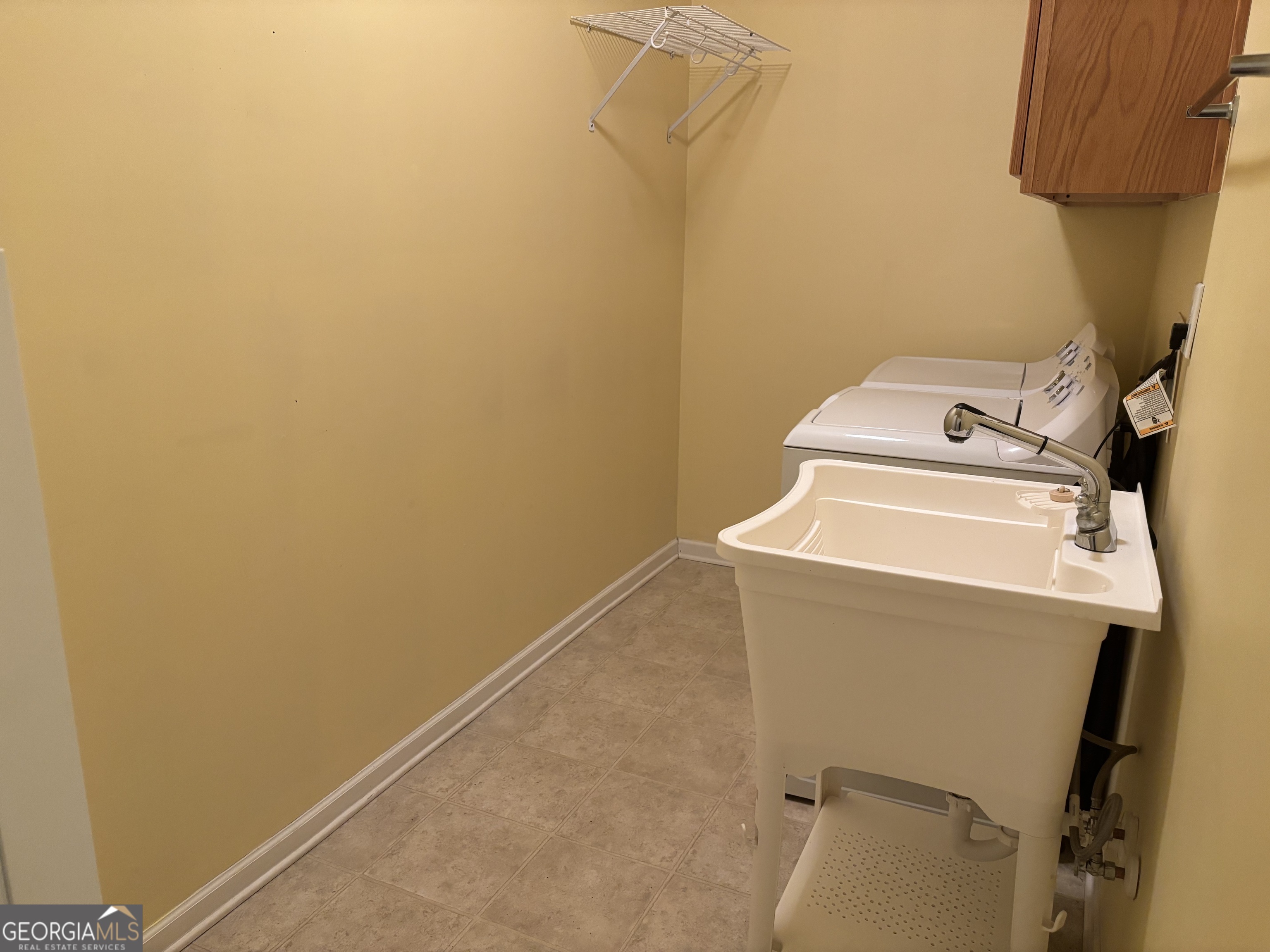 63 Highlander Trail Southwest Rome, GA 30165 - Photo 44 of 49 a utility room with dryer and washer