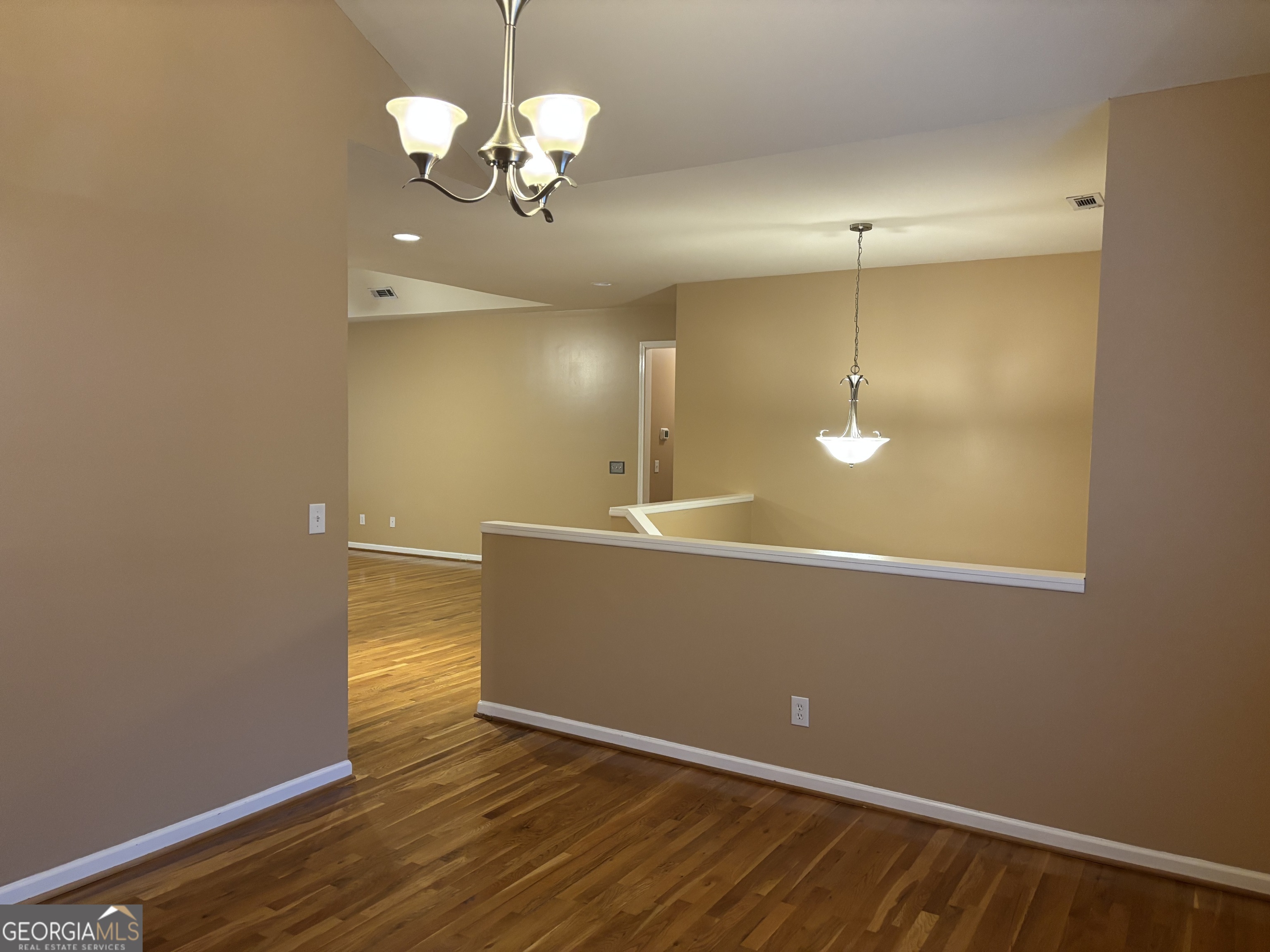 63 Highlander Trail Southwest Rome, GA 30165 - Photo 5 of 49 wooden floor in an empty room with a window