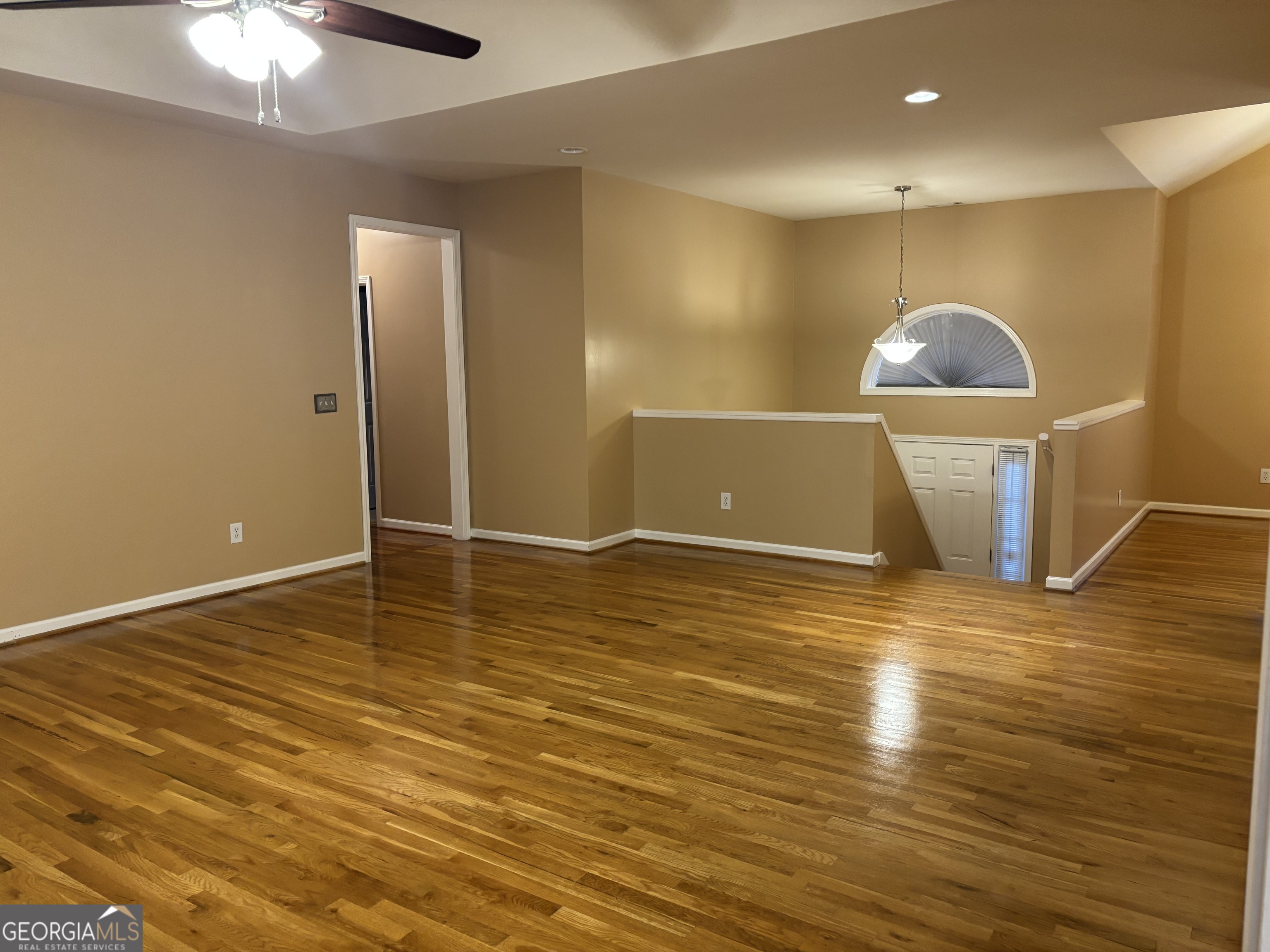 63 Highlander Trail Southwest Rome, GA 30165 - Photo 7 of 49 a view of a room with wooden floor and wall