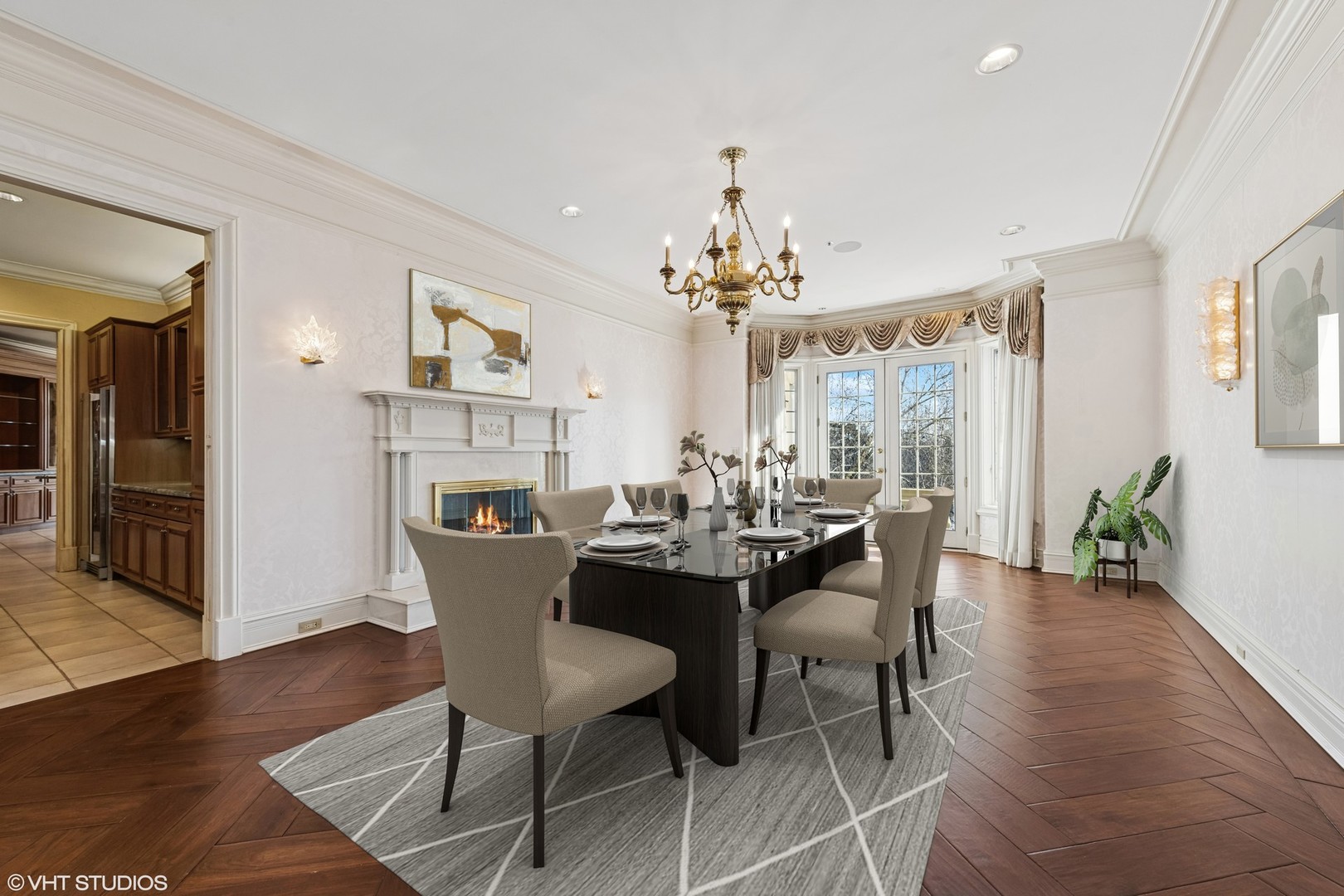 560 Oak Knoll Road Barrington Hills, IL 60010 - Photo 15 of 69 a view of a dining room with furniture and wooden floor