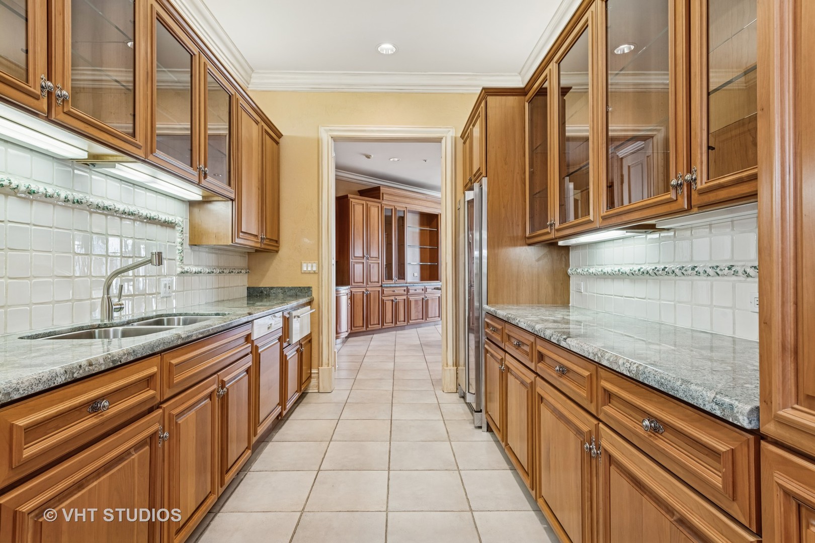 560 Oak Knoll Road Barrington Hills, IL 60010 - Photo 17 of 69 a view of a kitchen with stainless steel appliances granite countertop a sink and cabinets
