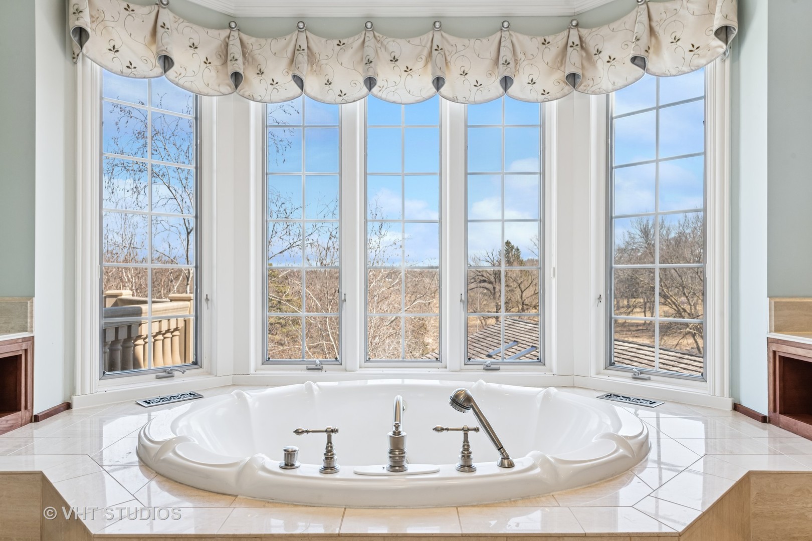 560 Oak Knoll Road Barrington Hills, IL 60010 - Photo 34 of 69 a white bath tub sitting in a bathroom next to a window