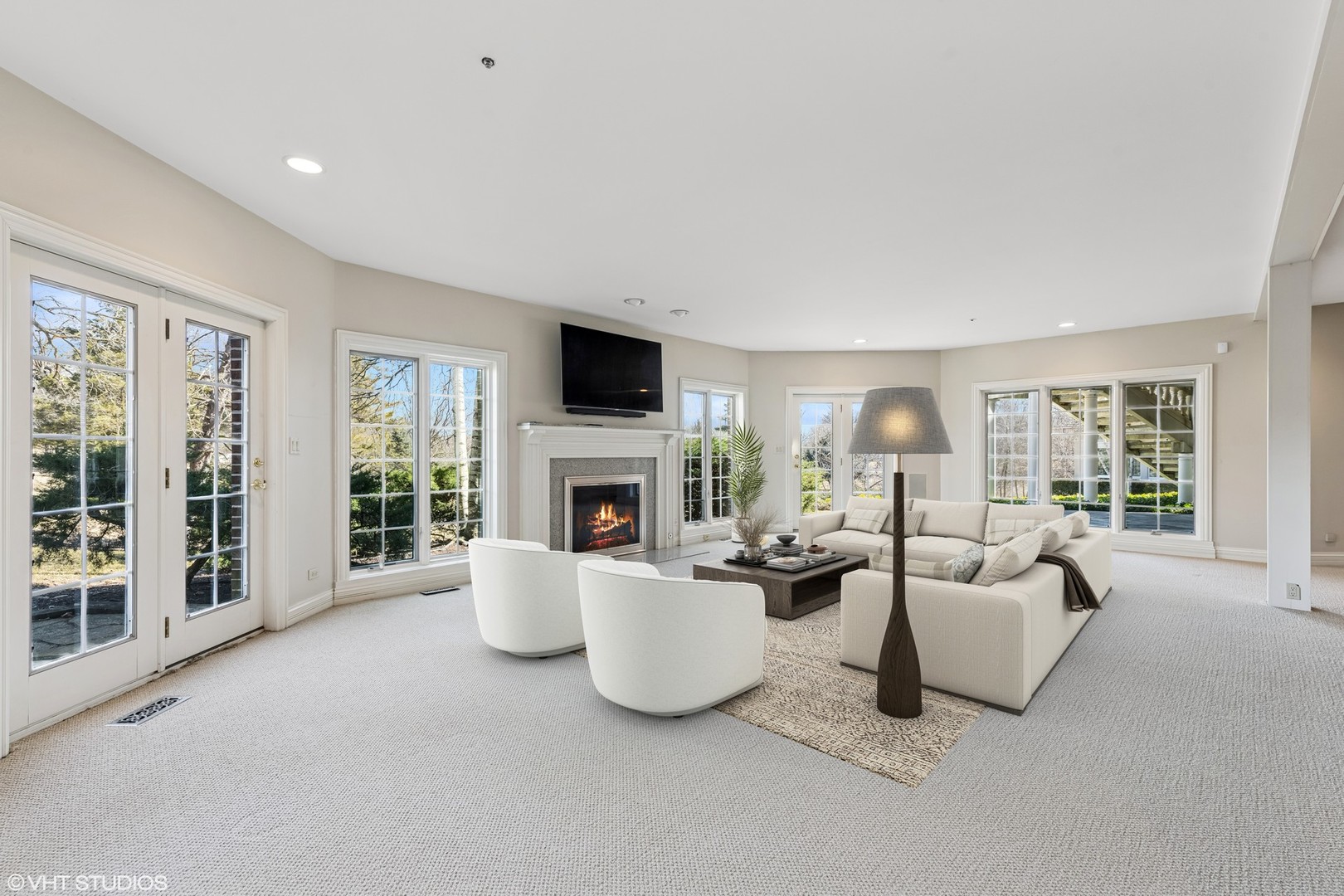 560 Oak Knoll Road Barrington Hills, IL 60010 - Photo 45 of 69 a living room with furniture and a fireplace