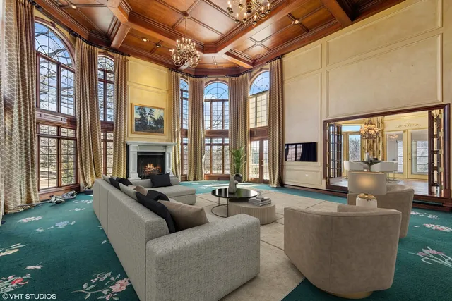 a kitchen with stainless steel appliances kitchen island granite countertop a large counter top and a stove