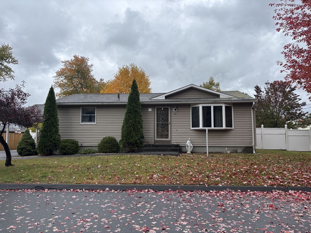 3 Henry Street Chicopee, MA 01020 - Photo 2 of 31 a front view of a house with a yard