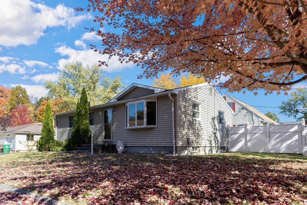 3 Henry Street Chicopee, MA 01020 - Photo 4 of 31 a view of a house with a yard