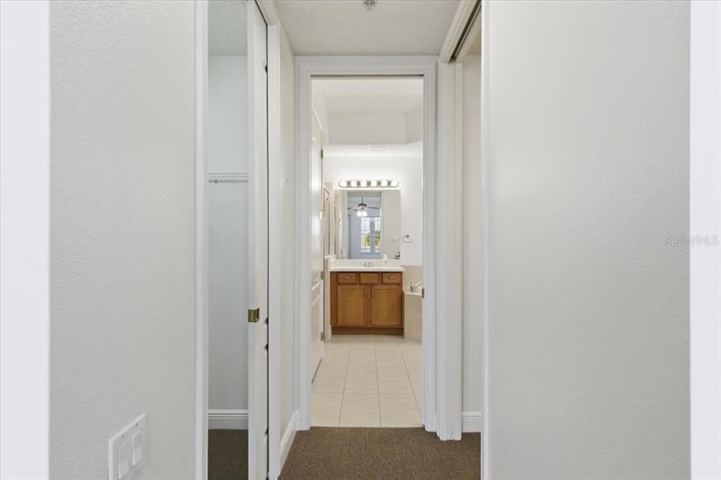 6515 Moorings Point Circle, Unit 102 Lakewood Ranch, FL 34202 - Photo 29 of 52 a bathroom with a window