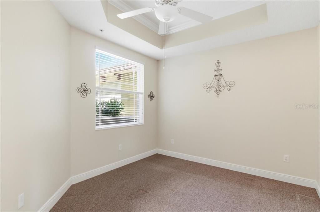 6515 Moorings Point Circle, Unit 102 Lakewood Ranch, FL 34202 - Photo 36 of 61 an empty room with a window