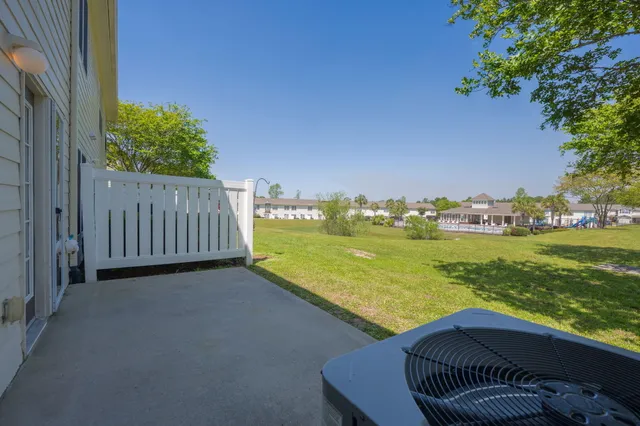 a view of a balcony with an ocean
