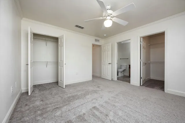 a view of a house with patio and a yard