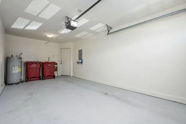 a view of a house with pool and chairs