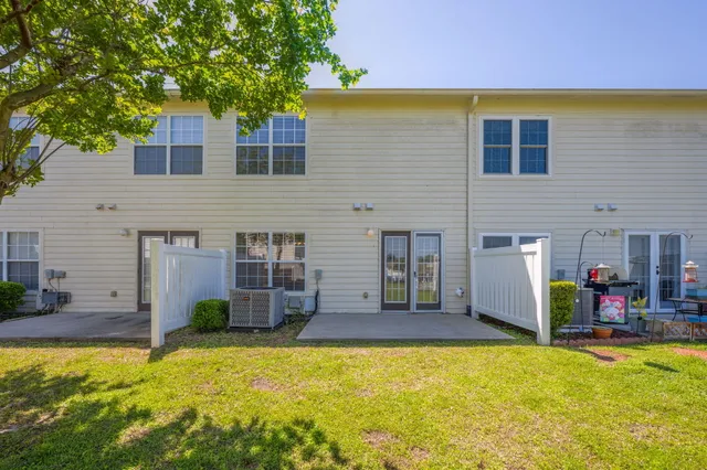 a view of a house with porch and sitting area