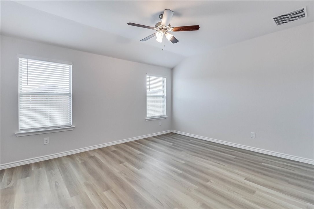 1634 Comfy Way Corpus Christi, TX 78418 - Photo 16 of 39 a view of an empty room with a window