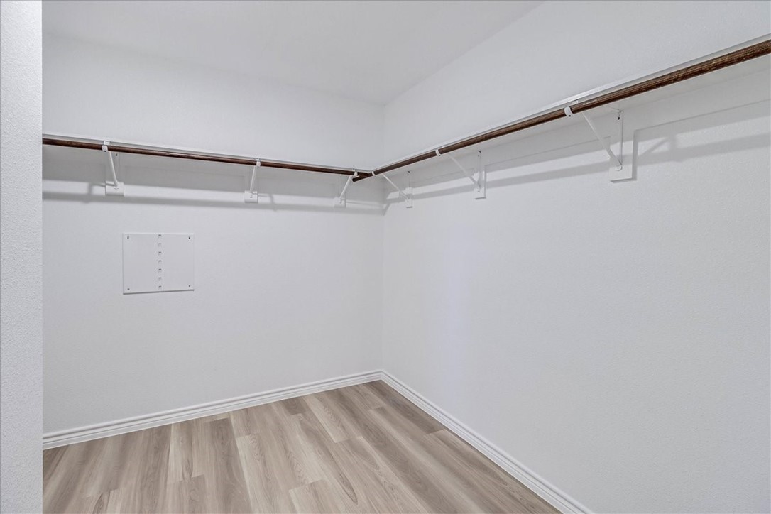 1634 Comfy Way Corpus Christi, TX 78418 - Photo 23 of 39 a view of an empty walk in closet