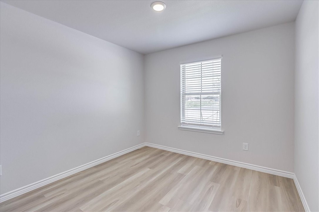 1634 Comfy Way Corpus Christi, TX 78418 - Photo 31 of 39 an empty room with a window