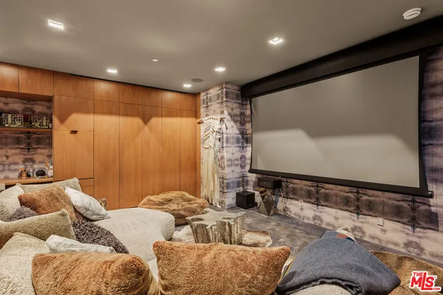 a workspace with furniture window and wooden floor