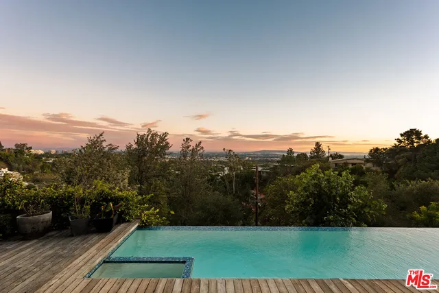 a view of a balcony with an outdoor space
