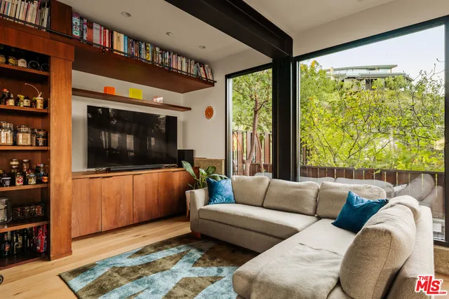 a kitchen with sink a counter top space and furniture
