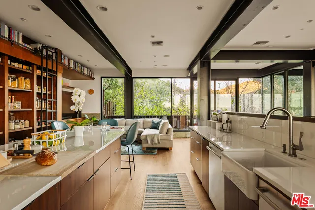 a view of a dining area with furniture window and wooden floor