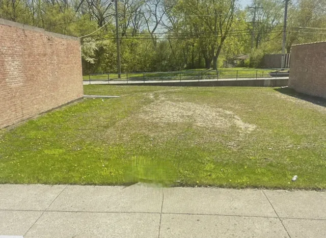 a view of a swimming pool with an outdoor space