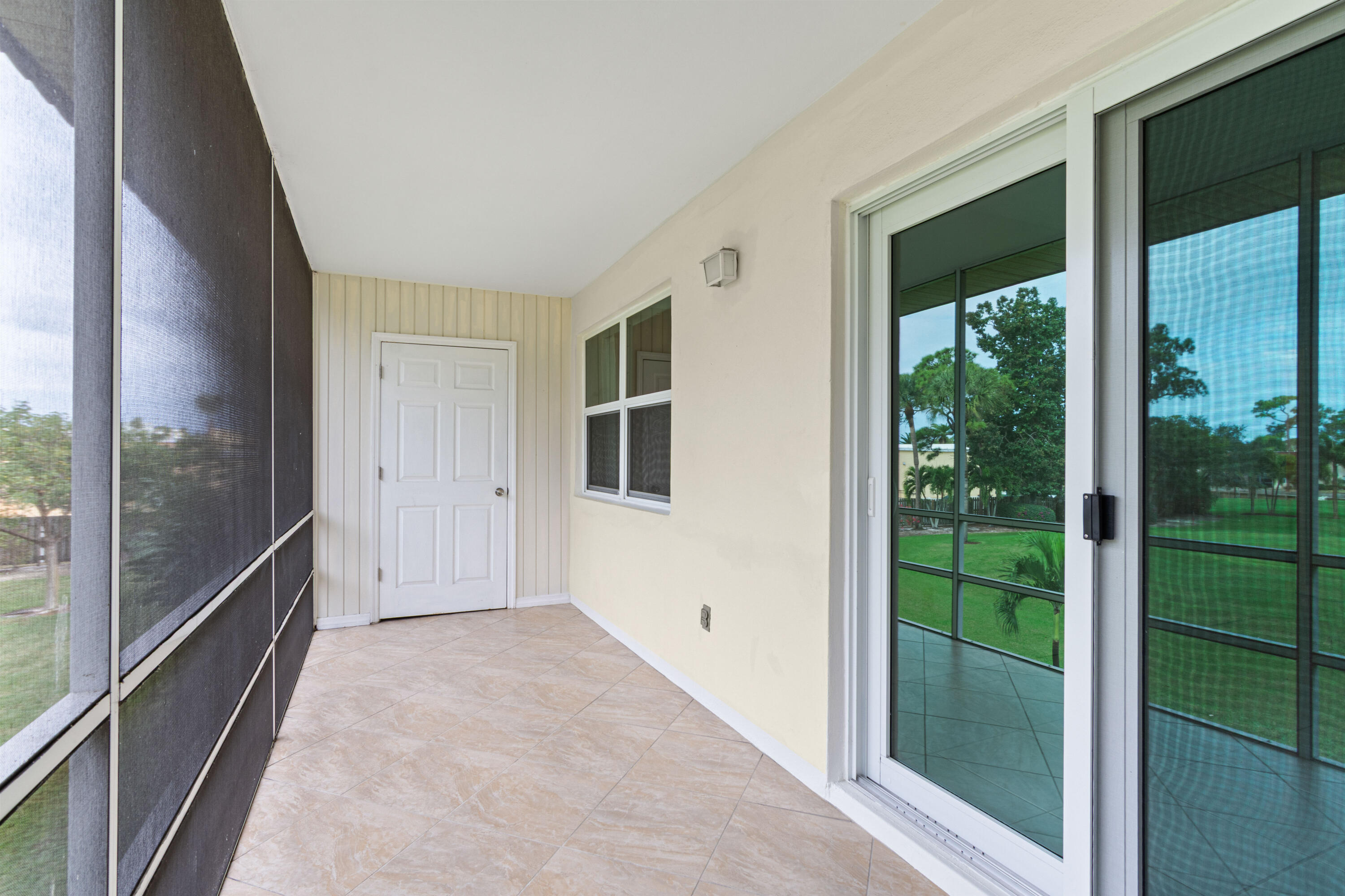 1981 Southwest Palm City Road, Unit 42H Stuart, FL 34994 - Photo 14 of 43 a view of hallway with stairs