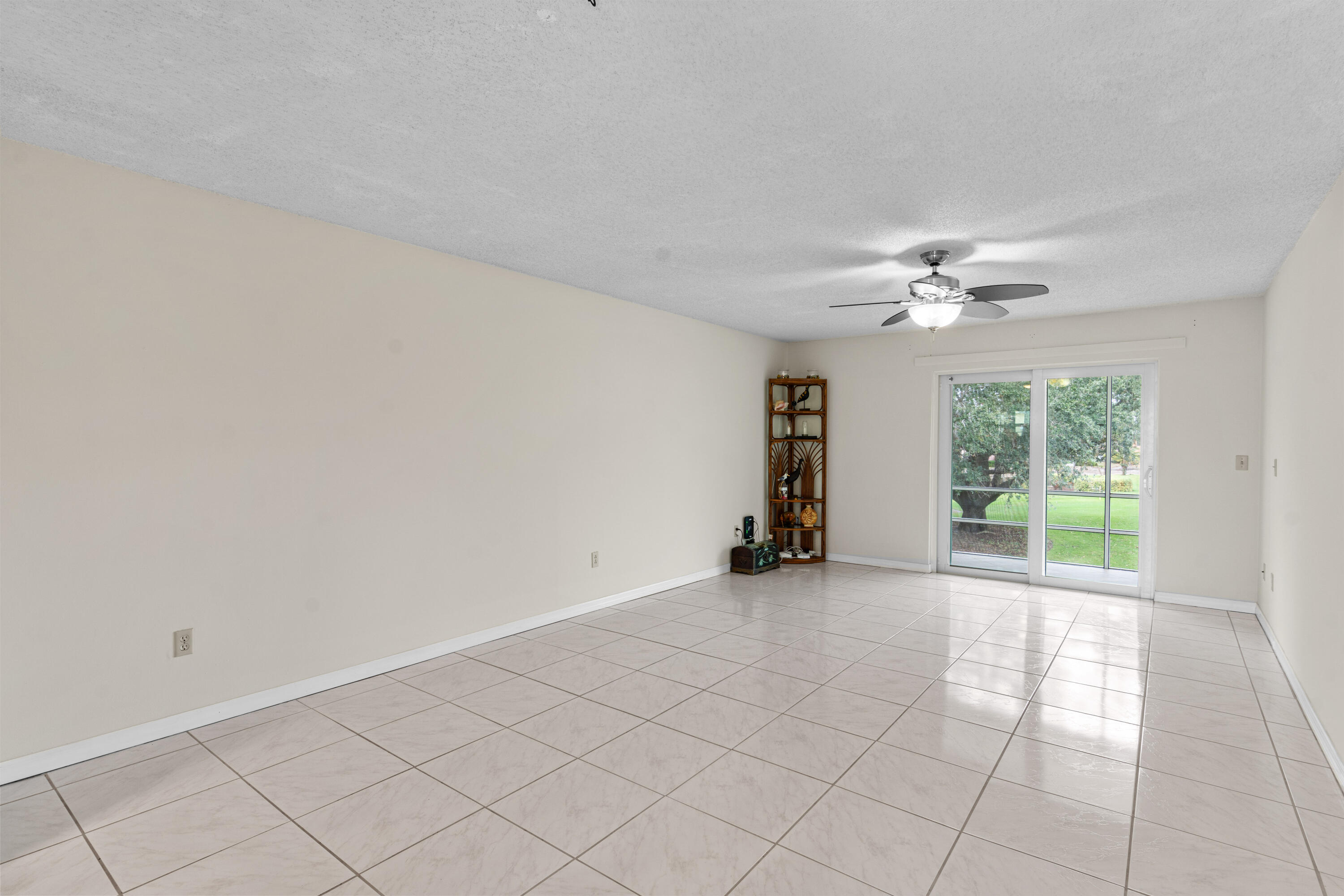 1981 Southwest Palm City Road, Unit 42H Stuart, FL 34994 - Photo 2 of 43 a view of an empty room with a window