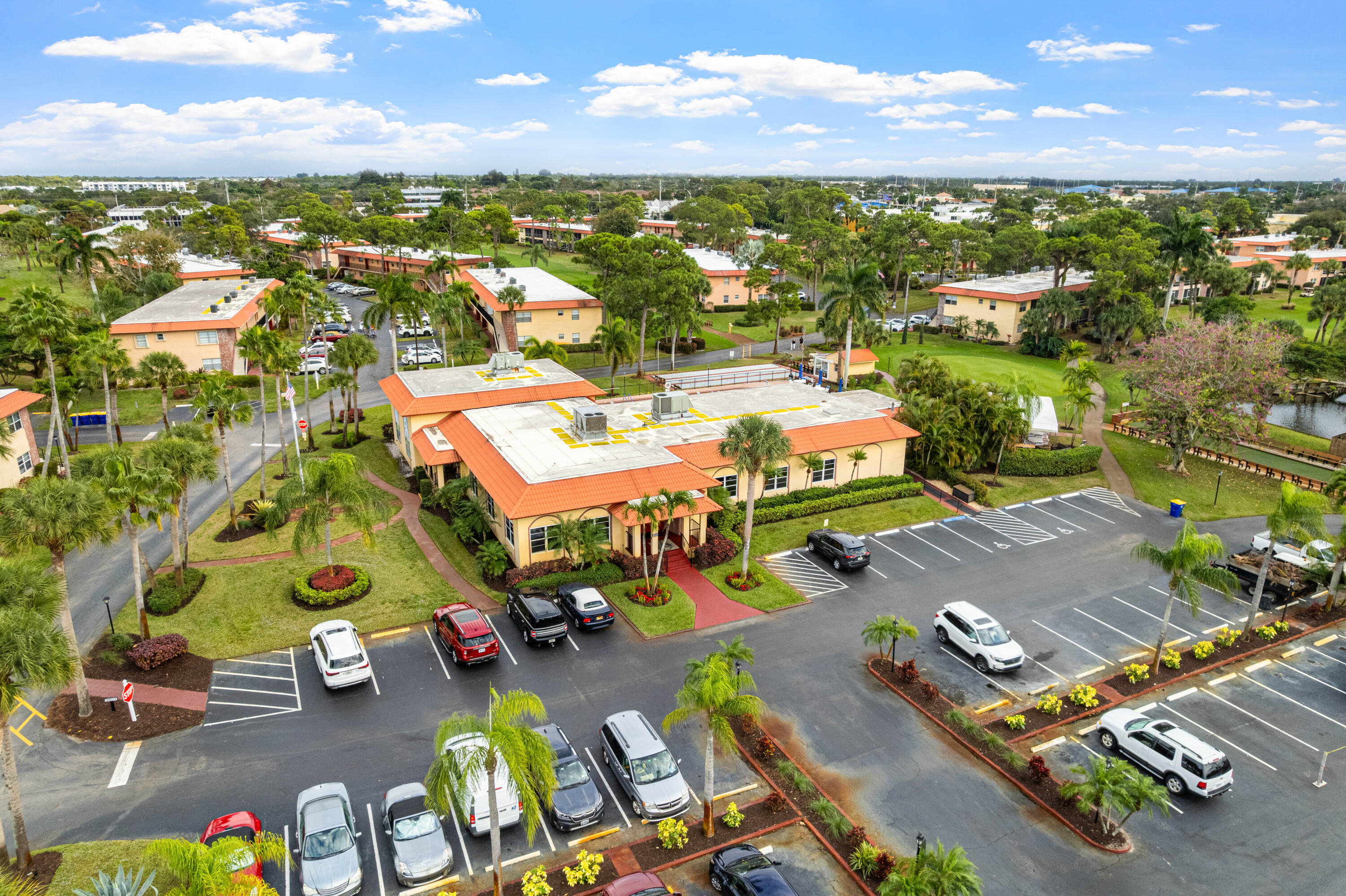 1981 Southwest Palm City Road, Unit 42H Stuart, FL 34994 - Photo 37 of 43 an aerial view of residential houses with outdoor space