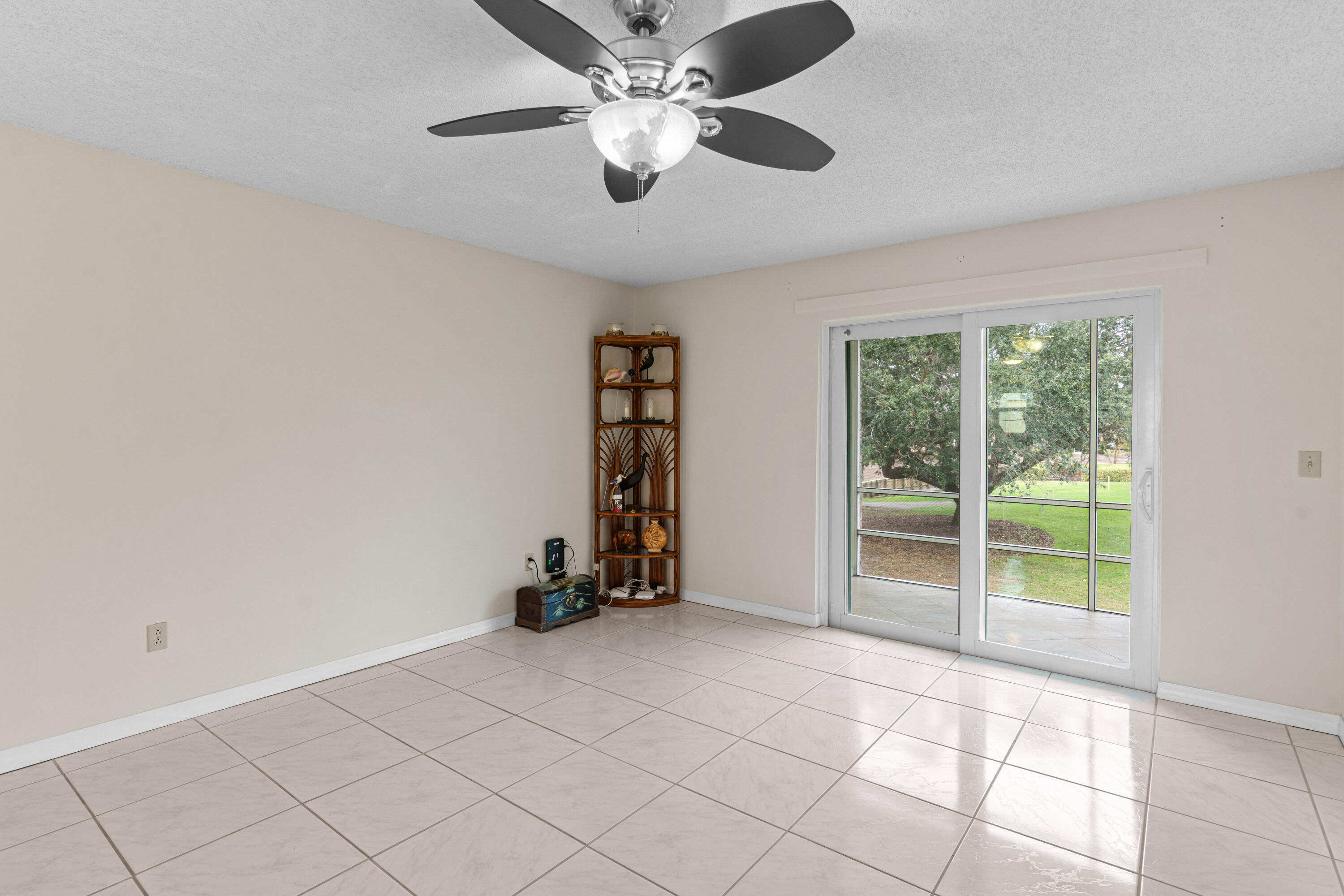1981 Southwest Palm City Road, Unit 42H Stuart, FL 34994 - Photo 9 of 43 a view of an empty room with a window